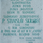 Spominska plošča p. Stanislava Škrabca ob vhodu v samostan